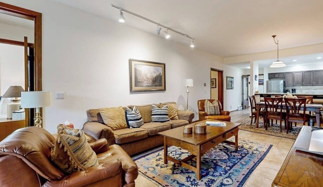 Conveniently located condo with W/D, full kitchen, & shared pool/hot tub