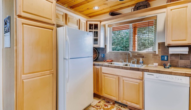 Dog-friendly home among the trees w/ fireplace, yard, & large deck
