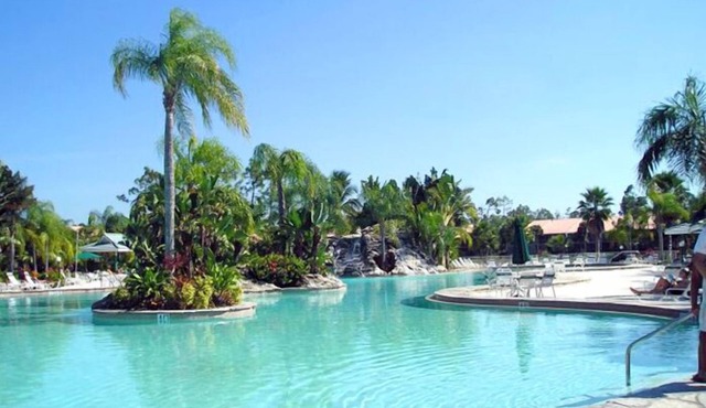 PARADISE FOUND! LAKEFRONT FIRST FLOOR CONDO IN TROPICAL FALLING WATERS
