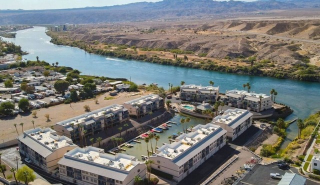 Relax on this beautiful River Front Get Away! Centrally located Unique Property