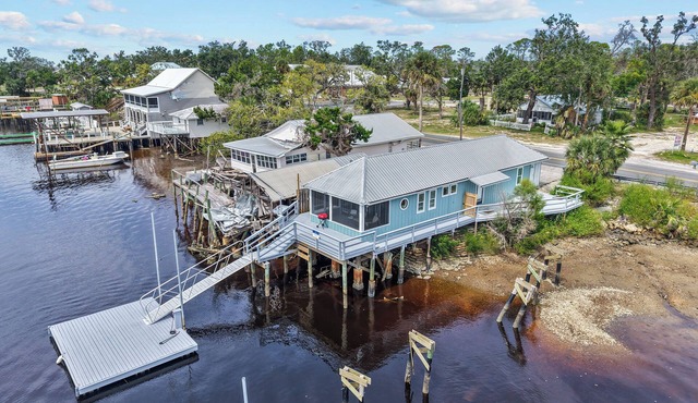 River Waterfront Retreat with Private Dock + Quick Gulf Access.