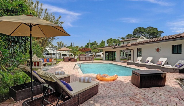 Spacious 5-bedroom Villa in Fort Lauderdale with heated pool on the water.