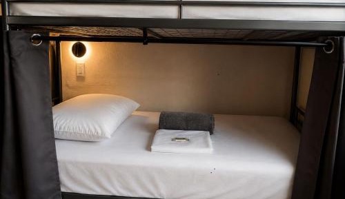 Single Bed in Dormitory Room
