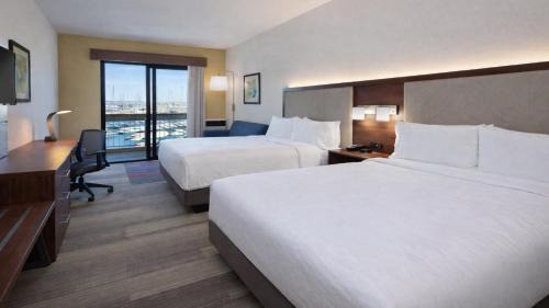 Queen Suite with Two Queen Beds and Sofa Bed